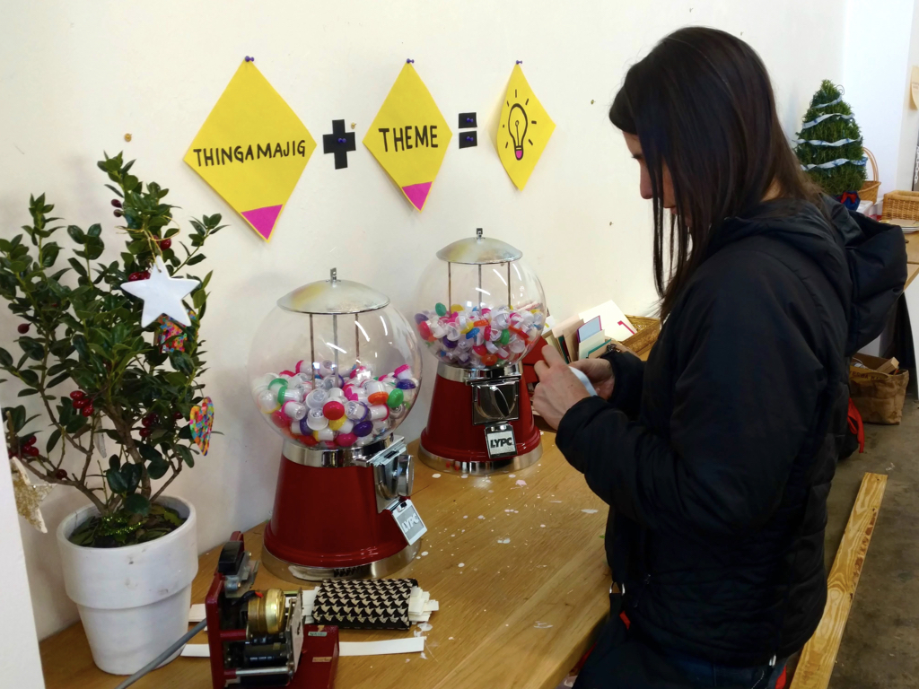 A woman uses the inspiration gumballs